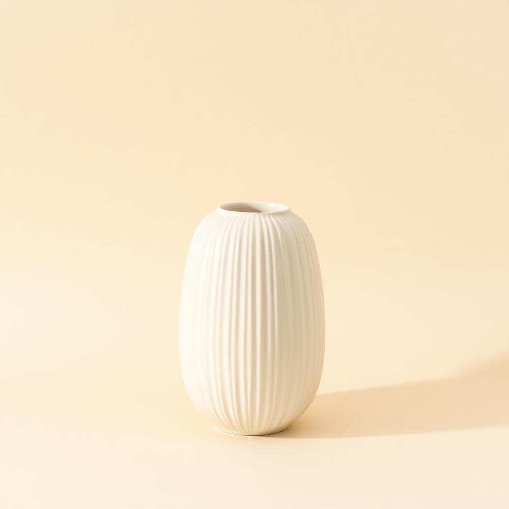 Ceramic vase styled with dried stems